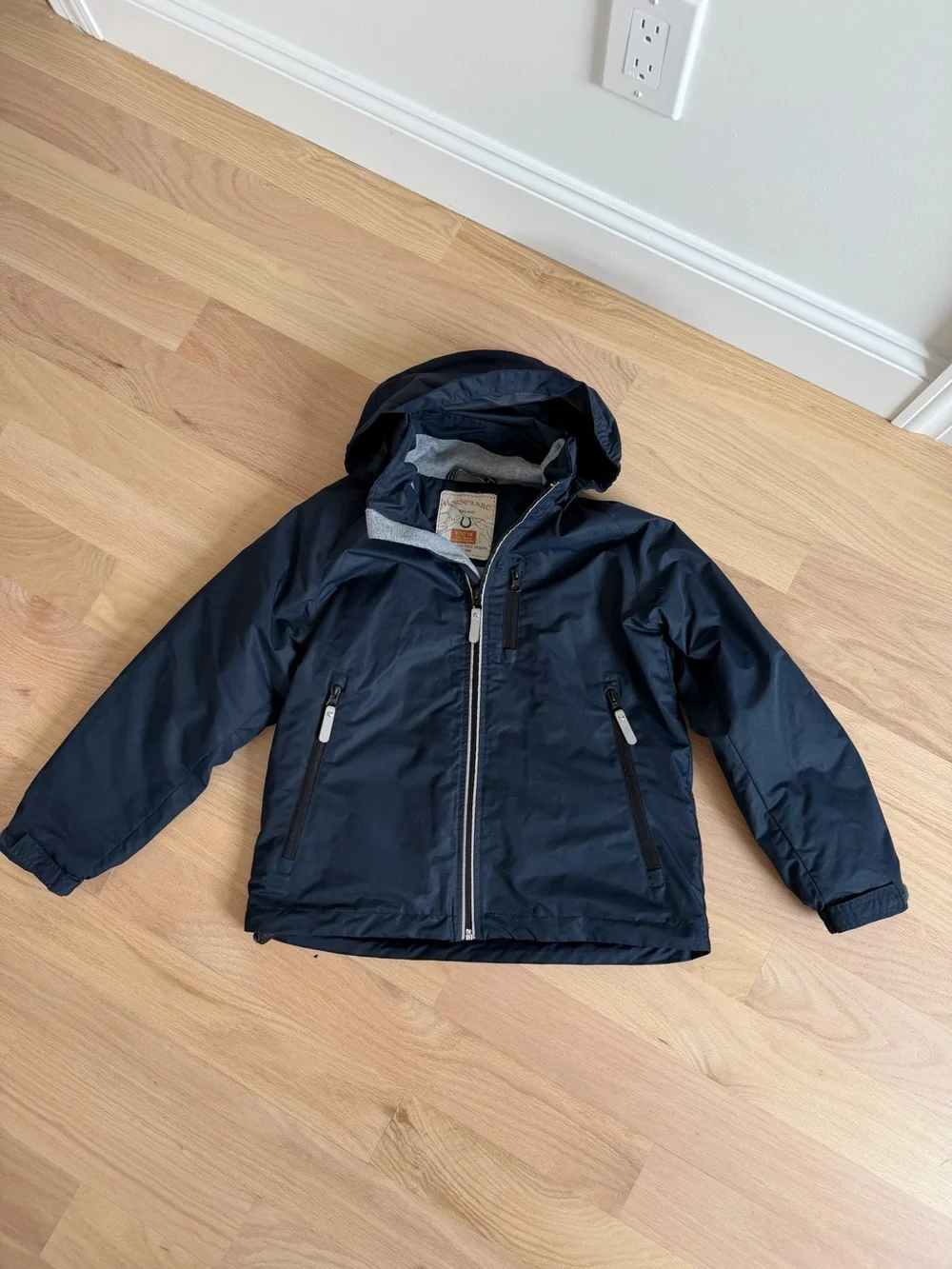 Size 9/10 Horseware Ireland Kids' Corrib Jacket in Navy Blue with hidden hood